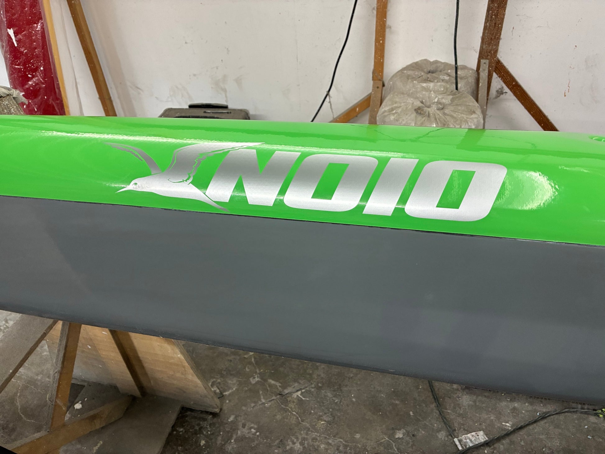 Noio decal detail on custom green deck